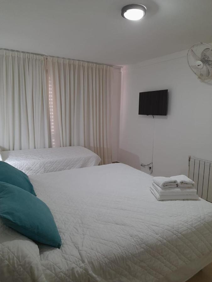 Intersur Villa Gesell Bagian luar foto